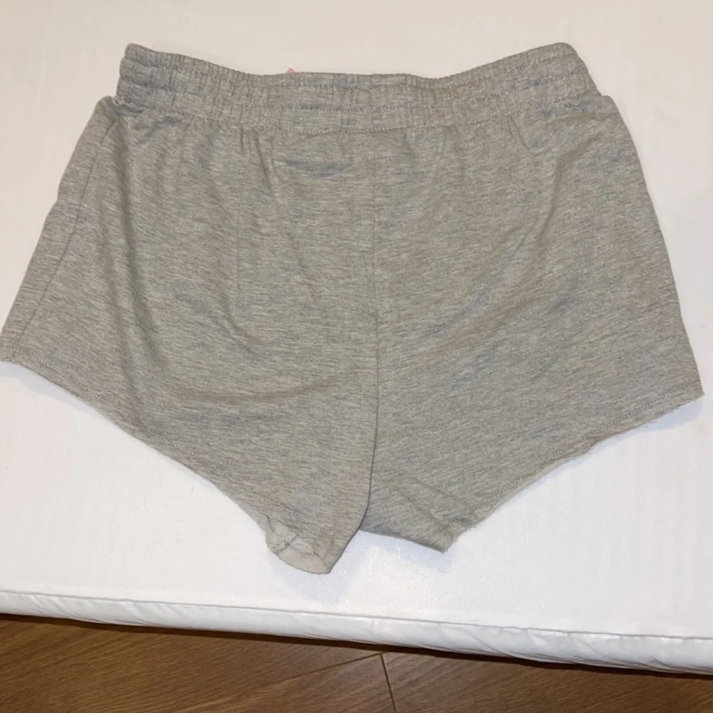 MTV pj cut off shorts 80% cotton gray‎ with a pink bow size medium NWT